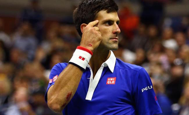 NEW YORK, NY - SEPTEMBER 13: Novak Djokovic of Serbia celebrates in the third set against Roger Federer of Switzerland during their Men's Singles Final match on Day Fourteen of the 2015 US Open at the USTA Billie Jean King National Tennis Center on September 13, 2015 in the Flushing neighborhood of the Queens borough of New York City.   Clive Brunskill/Getty Images/AFP
== FOR NEWSPAPERS, INTERNET, TELCOS & TELEVISION USE ONLY ==